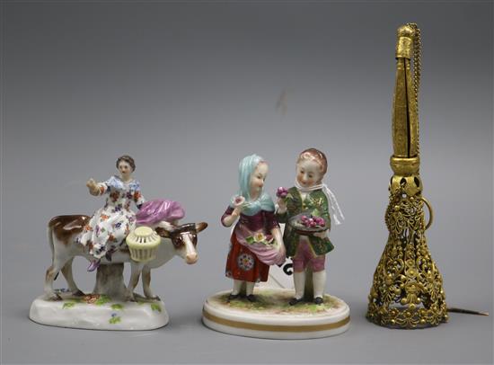 A gilt metal posy holder and a pair of German figures